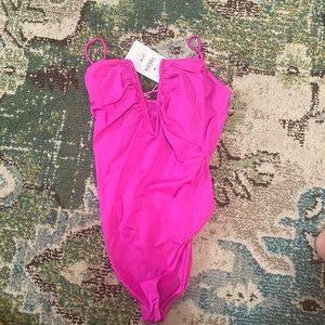 Pink low cut leotard
